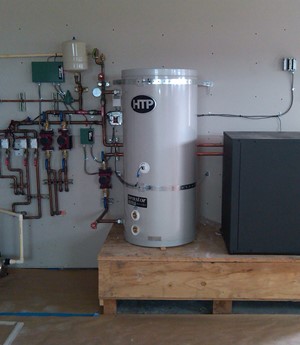 Geothermal Heat Pump with indirect tank and mechanical panel