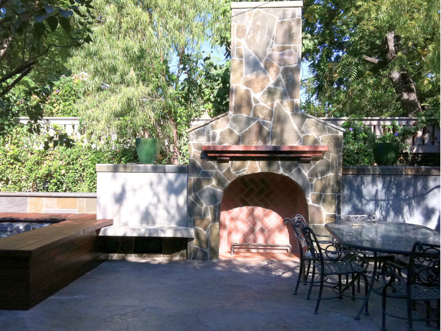finished patio and fireplace with radiant heating built in