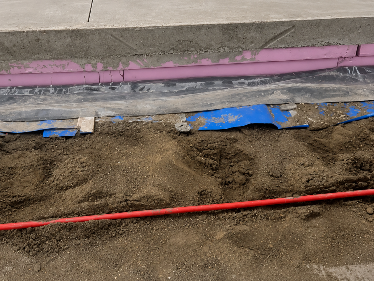 Layers between tubing and floor