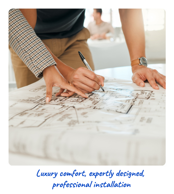 Two people looking over a custom new home blueprint to design radiant heating