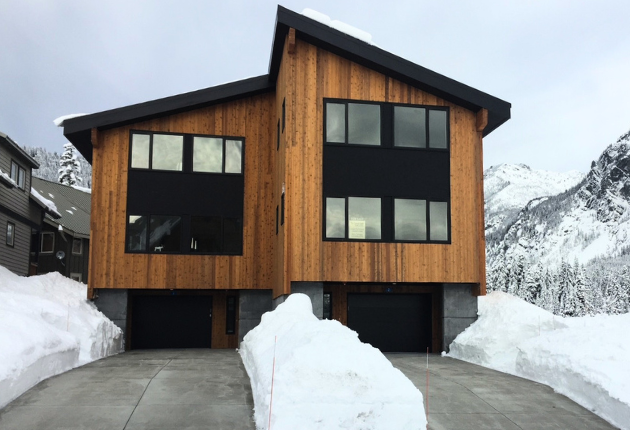 Snoqualmie Cabin with snowmelt driveway surrounded by 5 ft of snow
