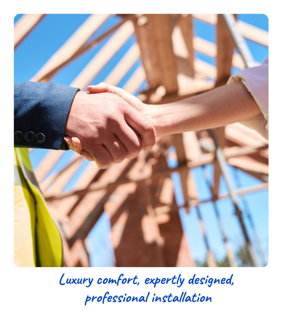 Homeowner and Contractor shaking hands under home framing for heating install.