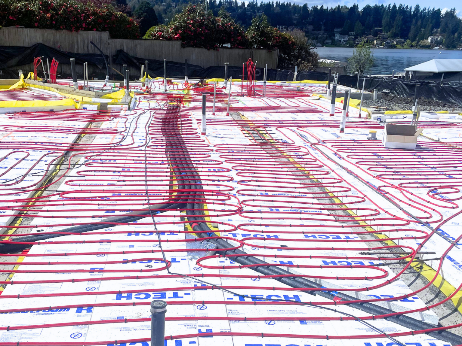 Red tubing before slab pour on lakefront property.