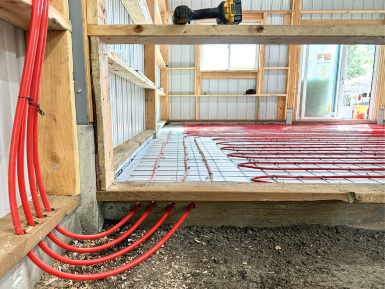 Manifold tube coming out of radiant heated zone