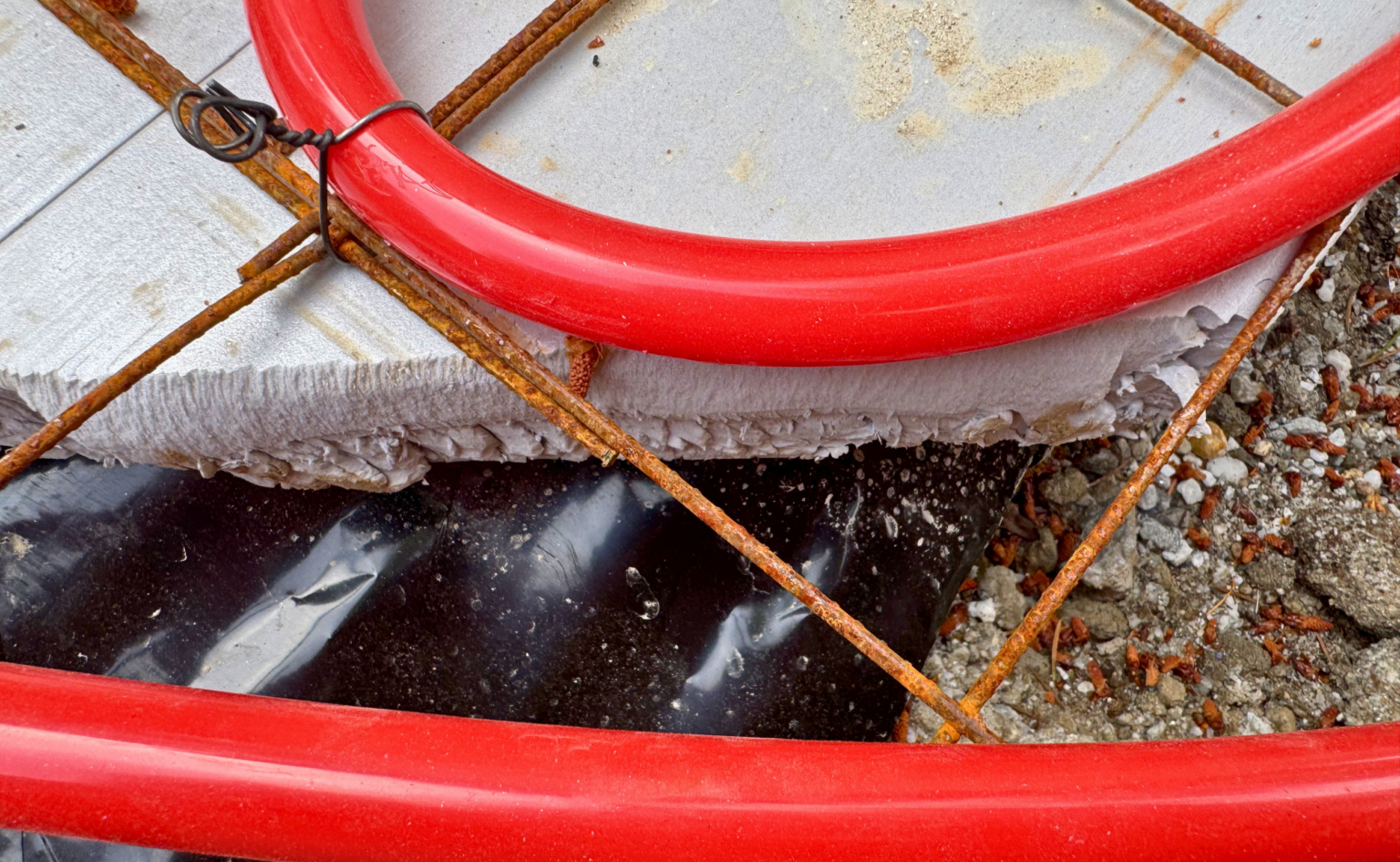 Pex, wire mesh, insulation, moisture barrier, and foundation layers