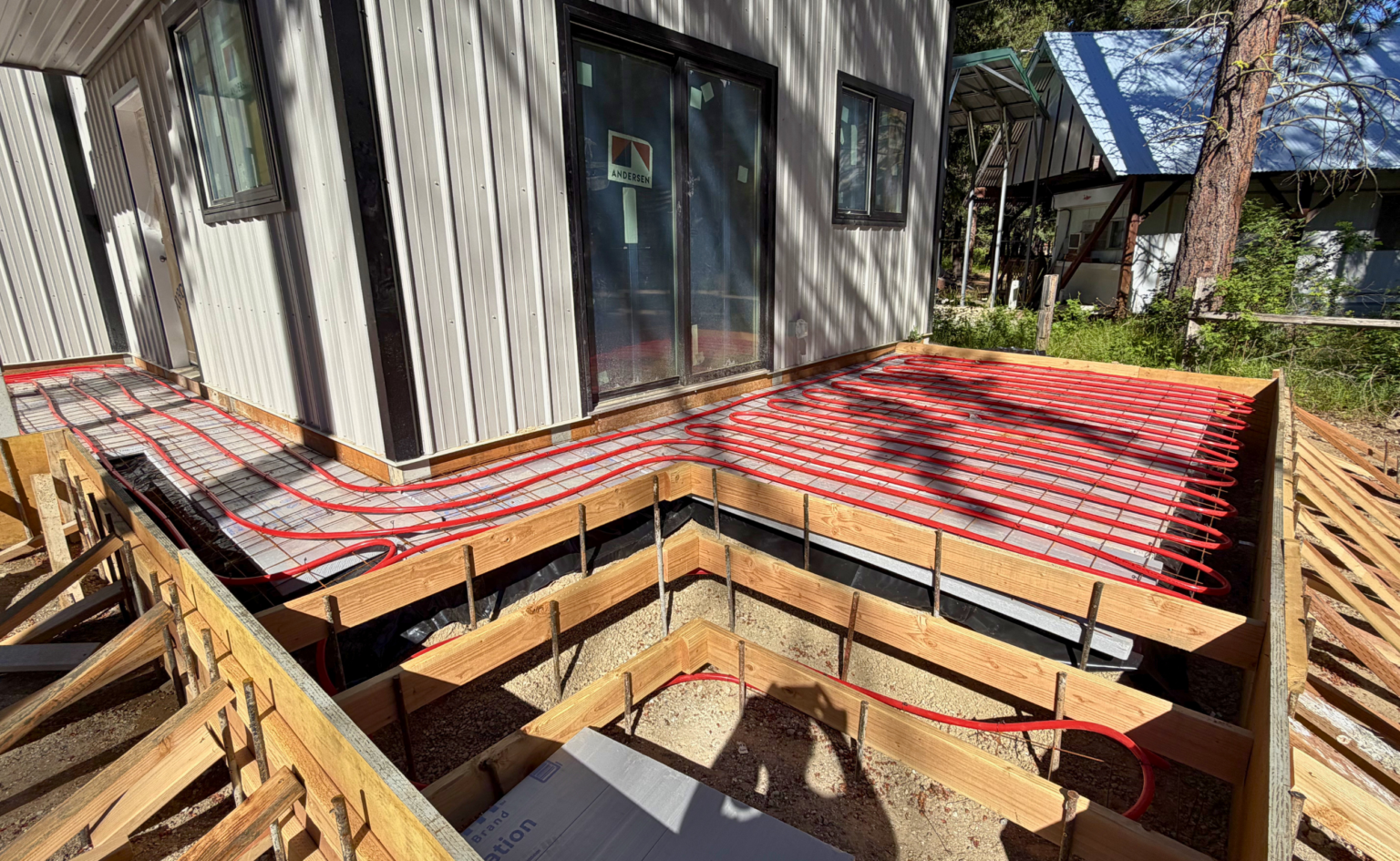 Heated patio before concrete pour showing pex tubing that will eventually run the warm water that will keep the snow melted.