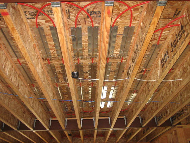Staple up plates from underneath - for upper floor heating.