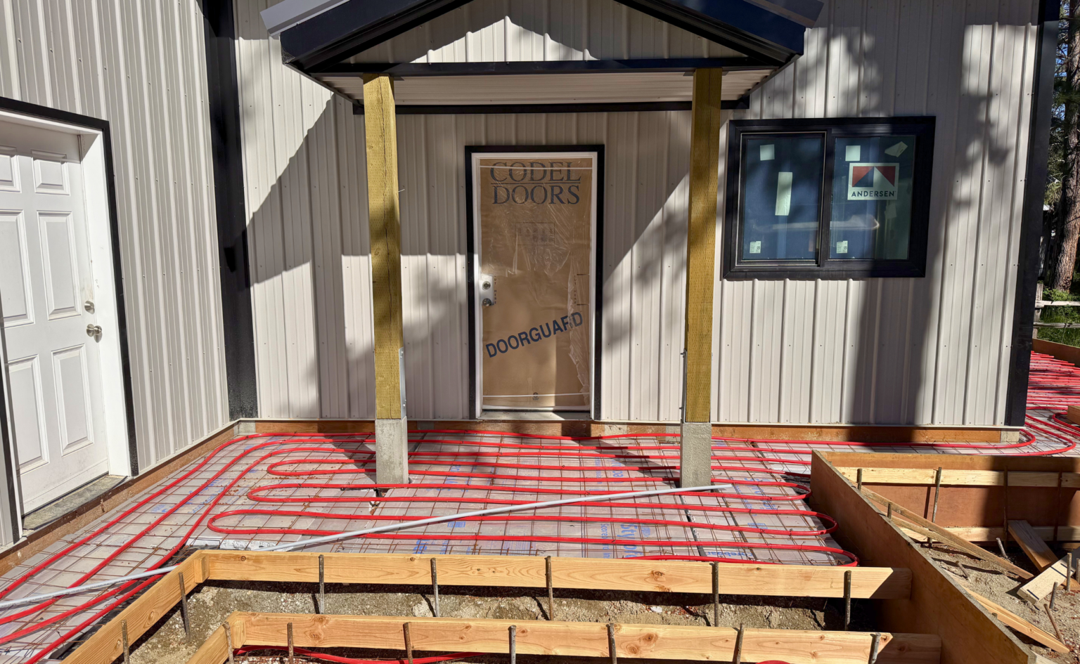 side heated patio before concrete
