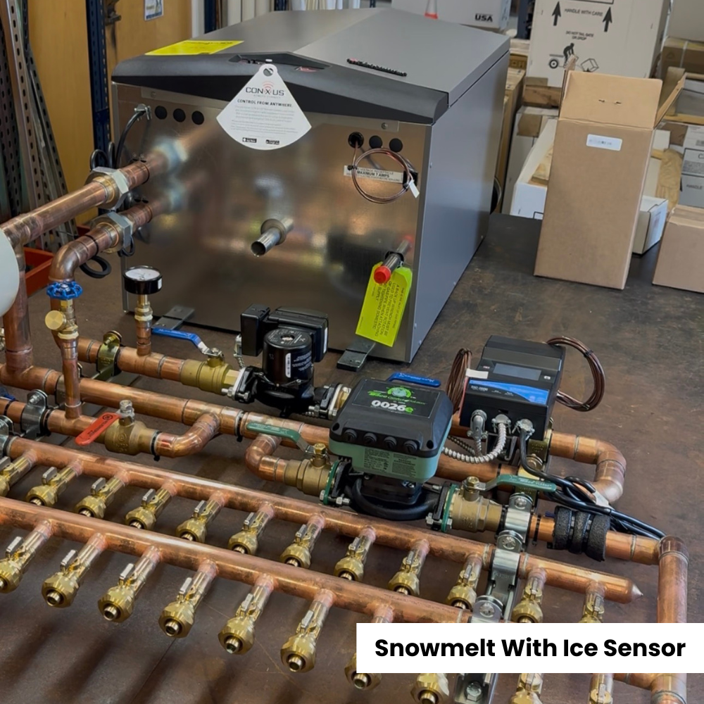 Large Lochinvar boiler, with 13 loop manifold built for a snowmelt system in Colorado