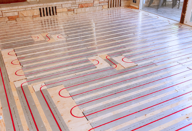 Rau Pamel with Pex tubing across living room floor