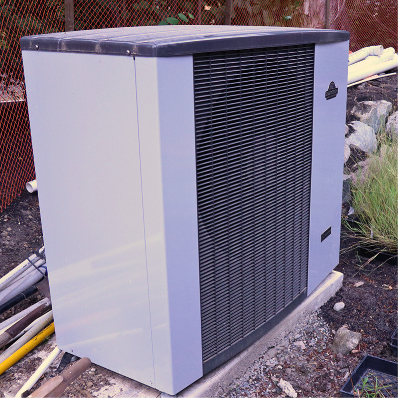 Air to water heat pump out side home on Bainbridge island