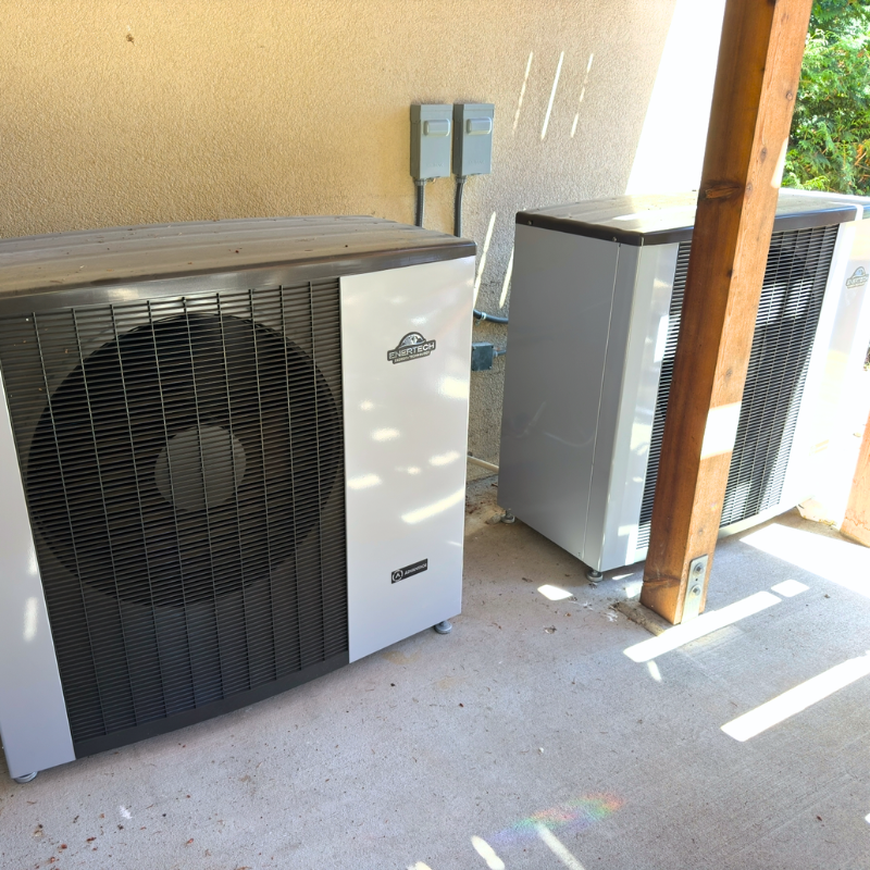 Two outdoor air to water heat pumps installed for a home for redundancy