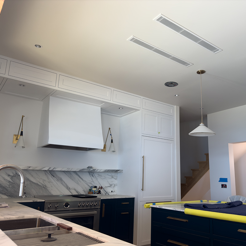 Jaga fan coil installed throughout home for cooling portion of the Air-to-water system set up in this Vashon Island home