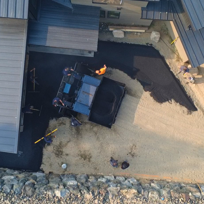 Asphalt snowmelt driveway installation photo