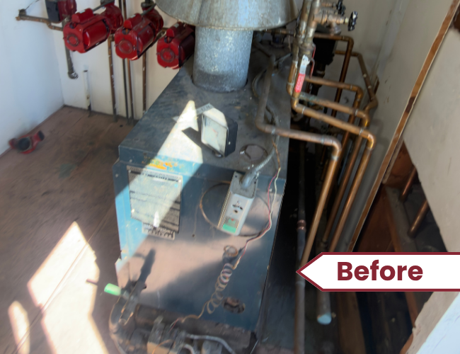 Old Cast-iron Boiler needed replacing in Seattle apartment building that provided heat to baseboard hydronic radiators